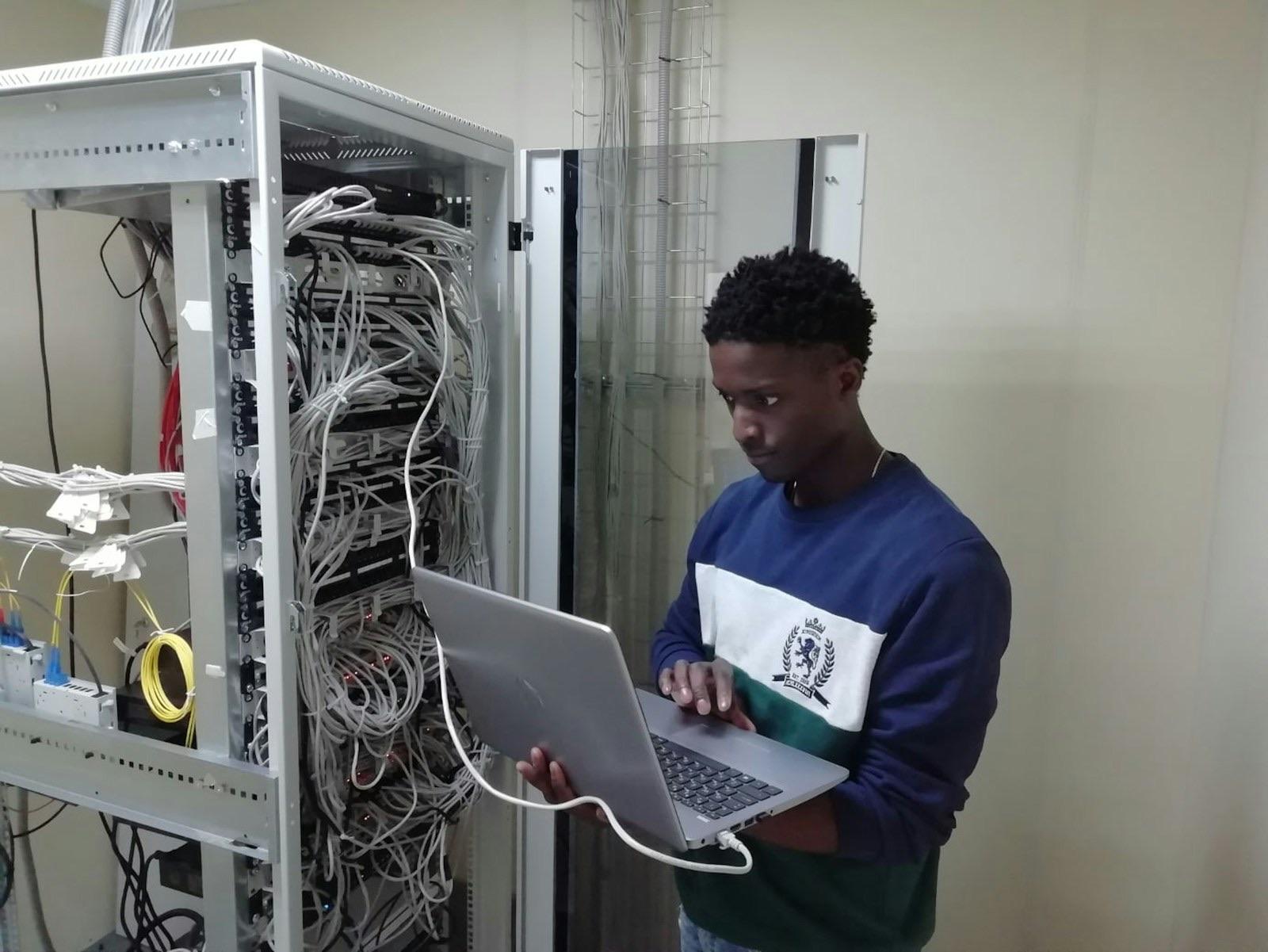 Network technician working with server infrastructure